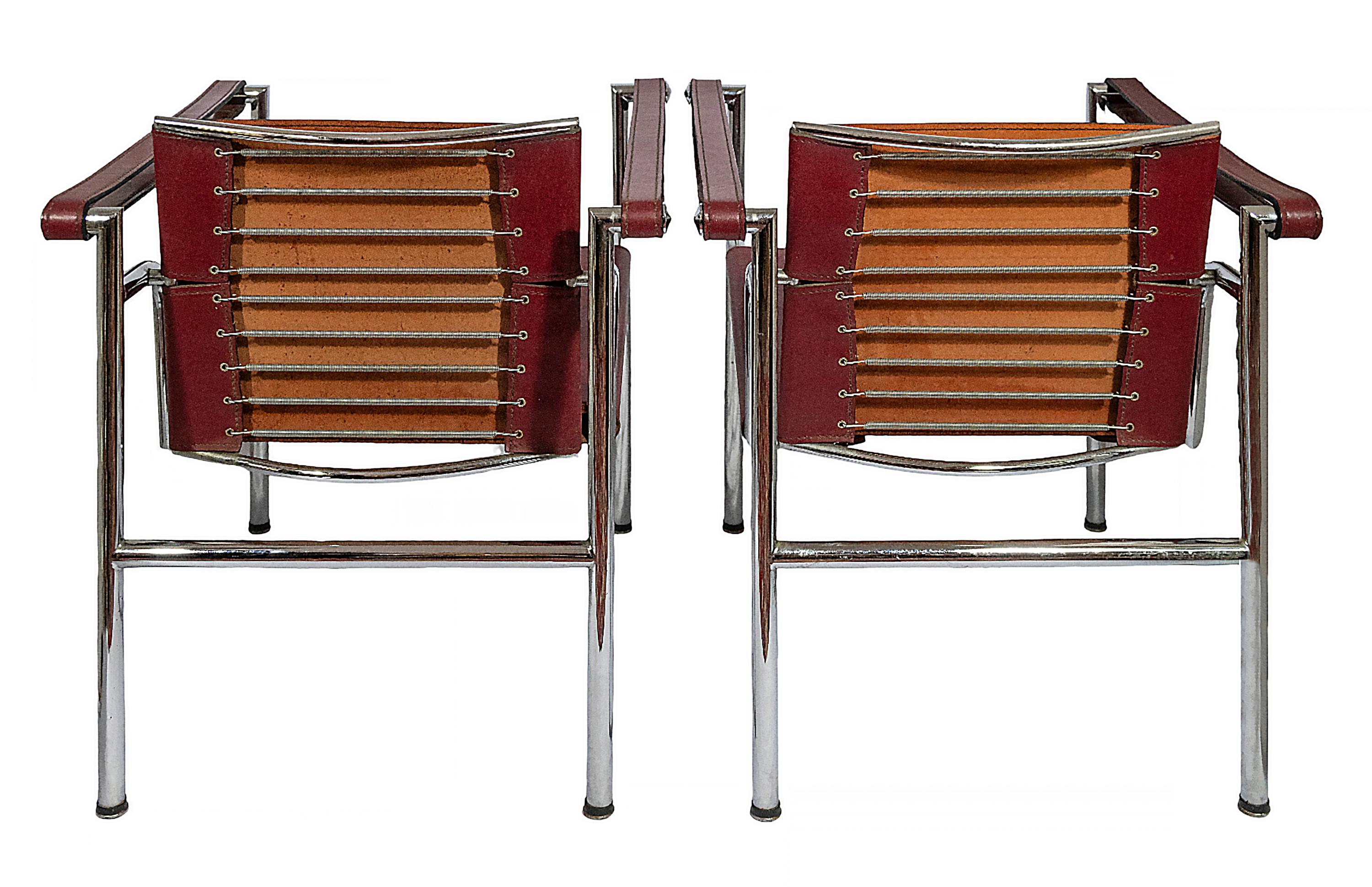 Pair of vintage LC1 chairs designed by Le Corbusier circa 1928's.
Base is chromed, cherry colour leather upholstery. 
Numbers marked on the frame, labeled Cassina.
Good vintage condition.

 

 