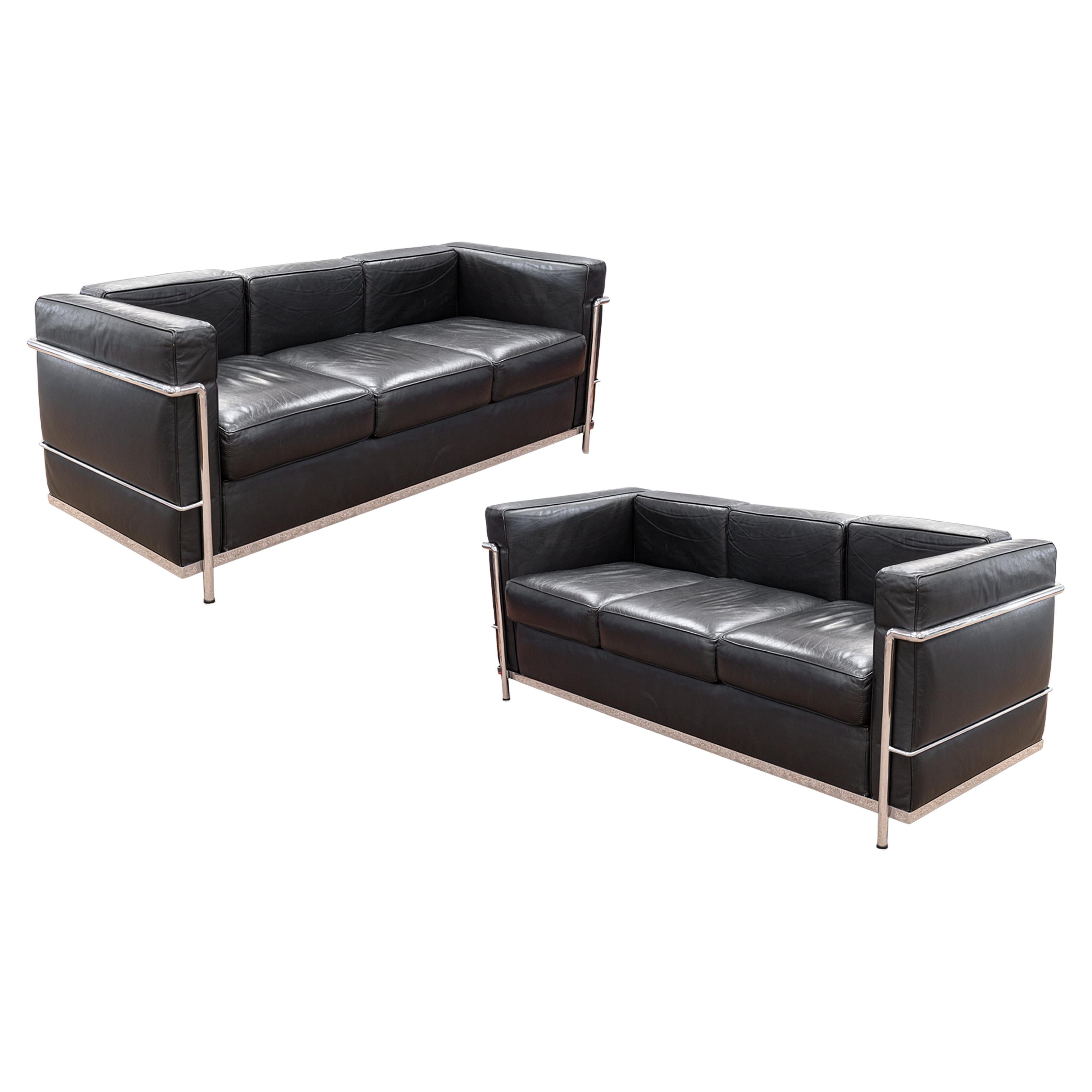 Pair of Le Corbusier Style Chrome Frame and Black Leather Mid Century Sofas