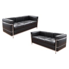 Pair of Le Corbusier Style Chrome Frame and Black Leather Mid Century Sofas