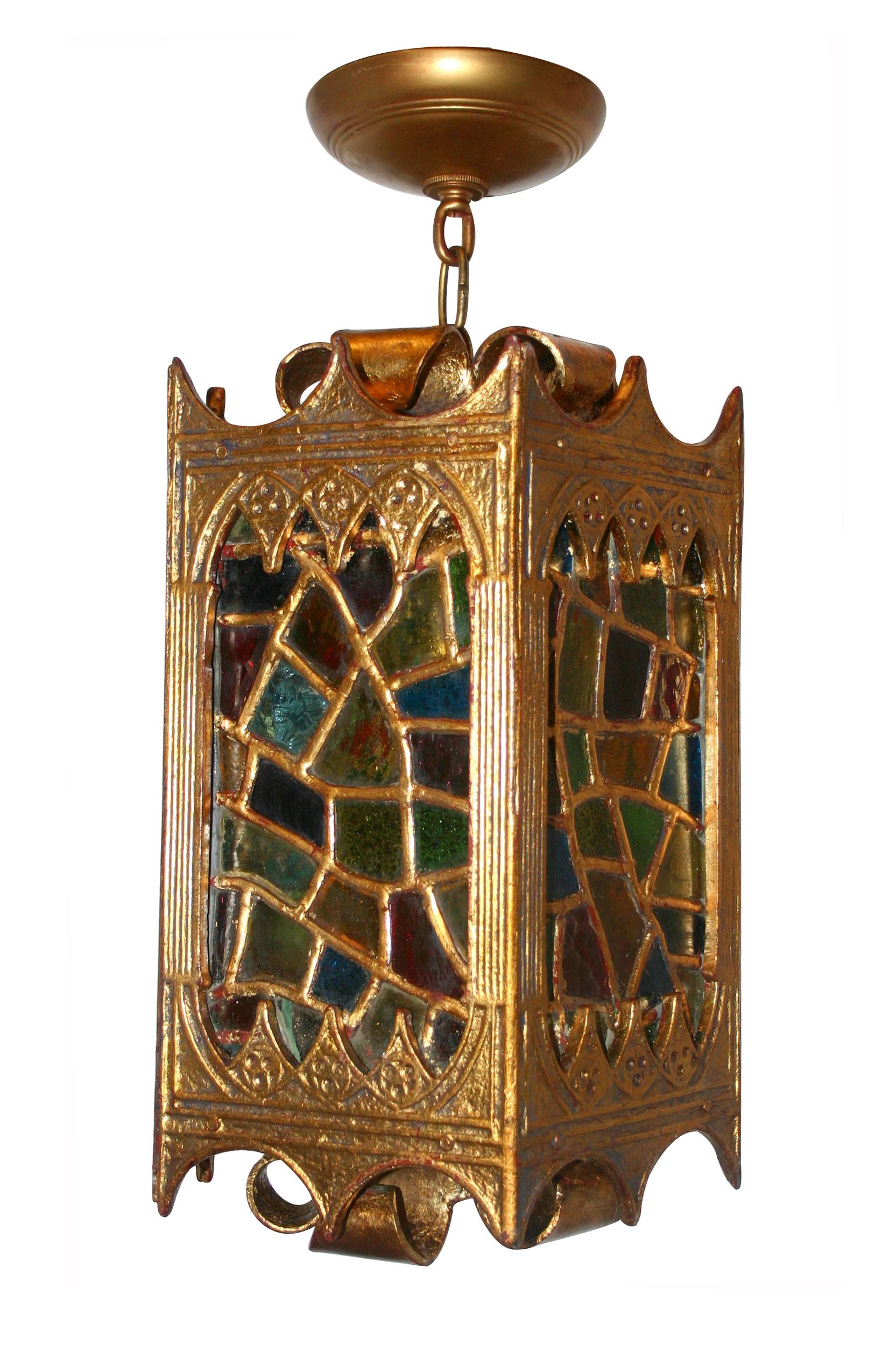 Pair of circa 1940's French gilt metal lanterns with leaded glass insets. Sold individually.

Measurements:
Height: 19