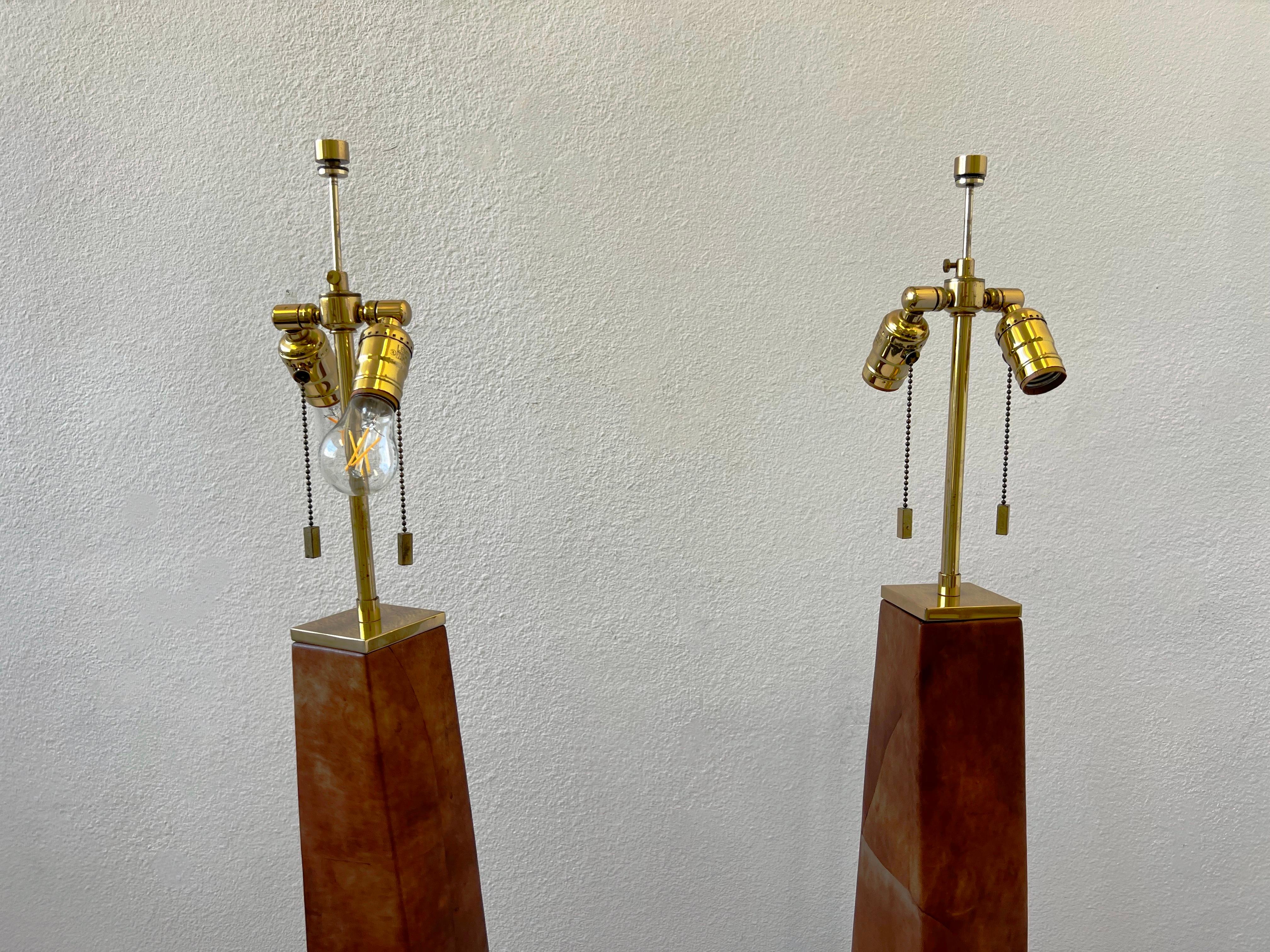 Polished Pair of Leather and Brass Floor Lamps by Karl Springer  For Sale