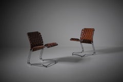 Pair of leather and chrome side chairs, Italy 1960s