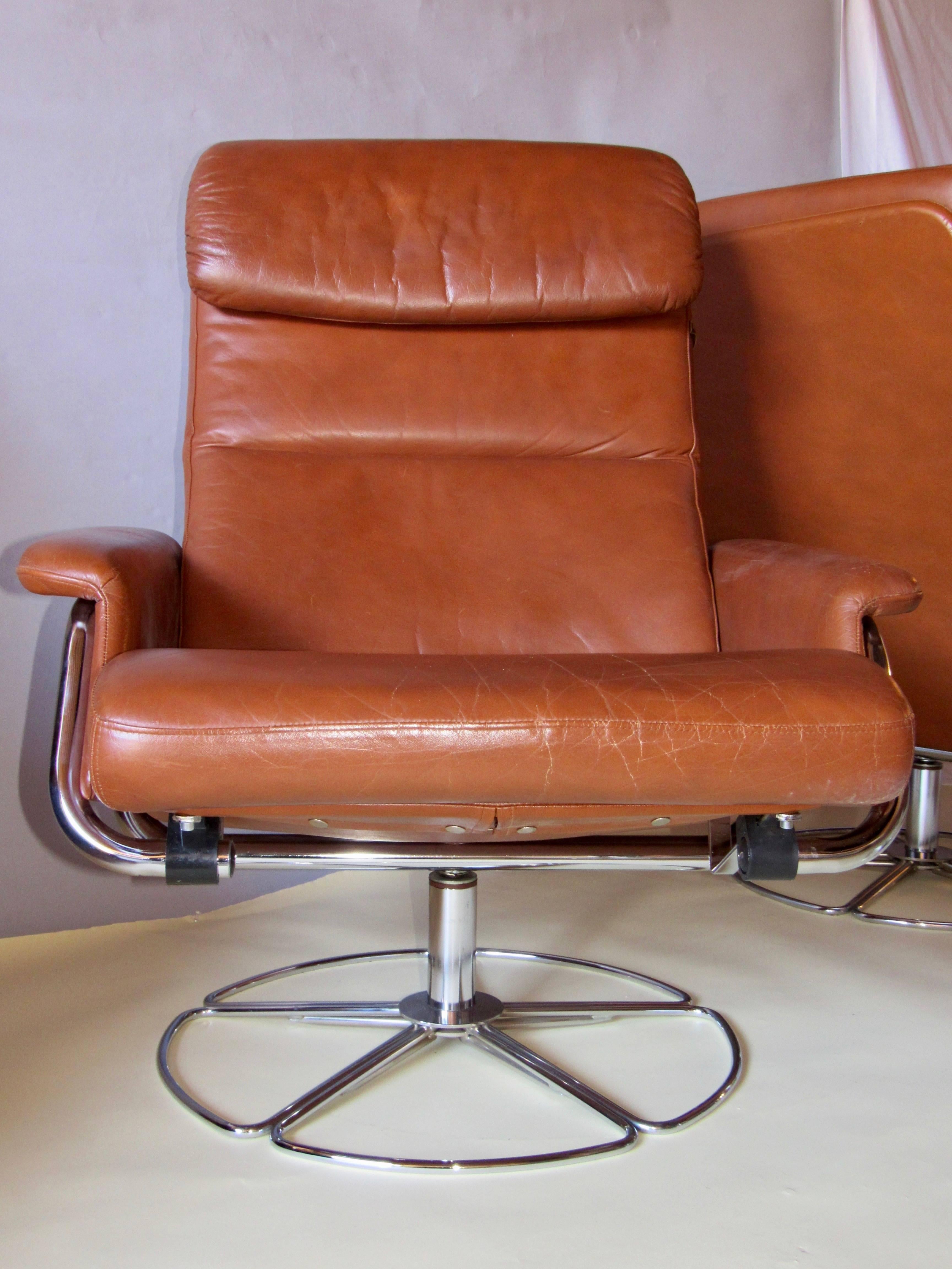 Swedish Bruno Mathsson Pair of DUX  Chrome Swivel Lounge Chairs and Ottomans 1970s