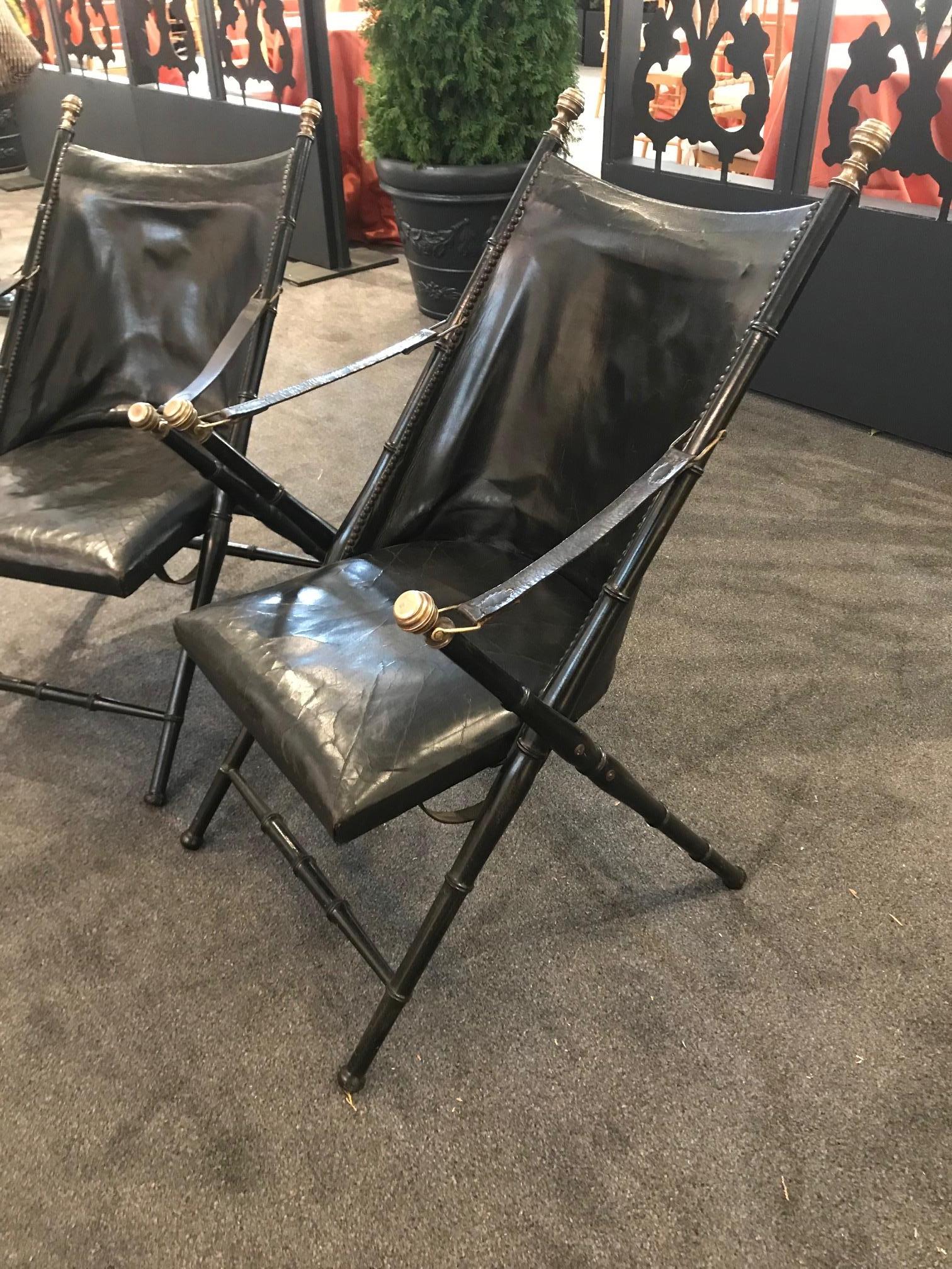 Mid-20th Century Pair of Leather and Ebonized Pear Wood Folding Chairs by Maison Jansen