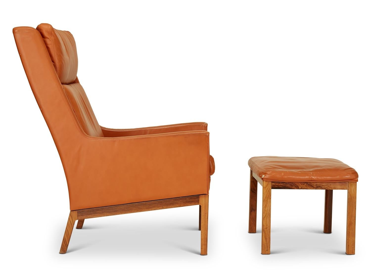 Pair leather and rosewood chairs and stool by Kai Lyngfeldt Larsen

Chair Dimensions: 26