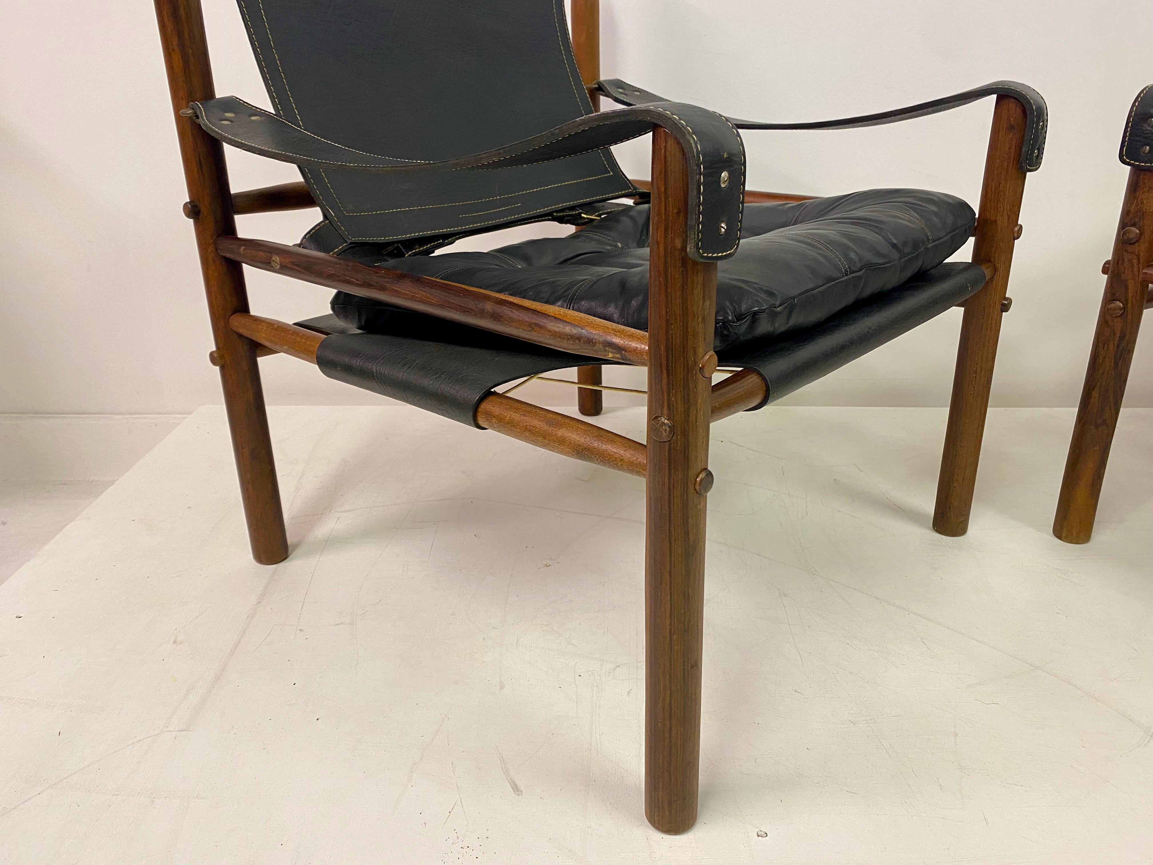 Pair of Leather and Rosewood Sirocco Safari Chairs by Arne Norell In Good Condition In London, London