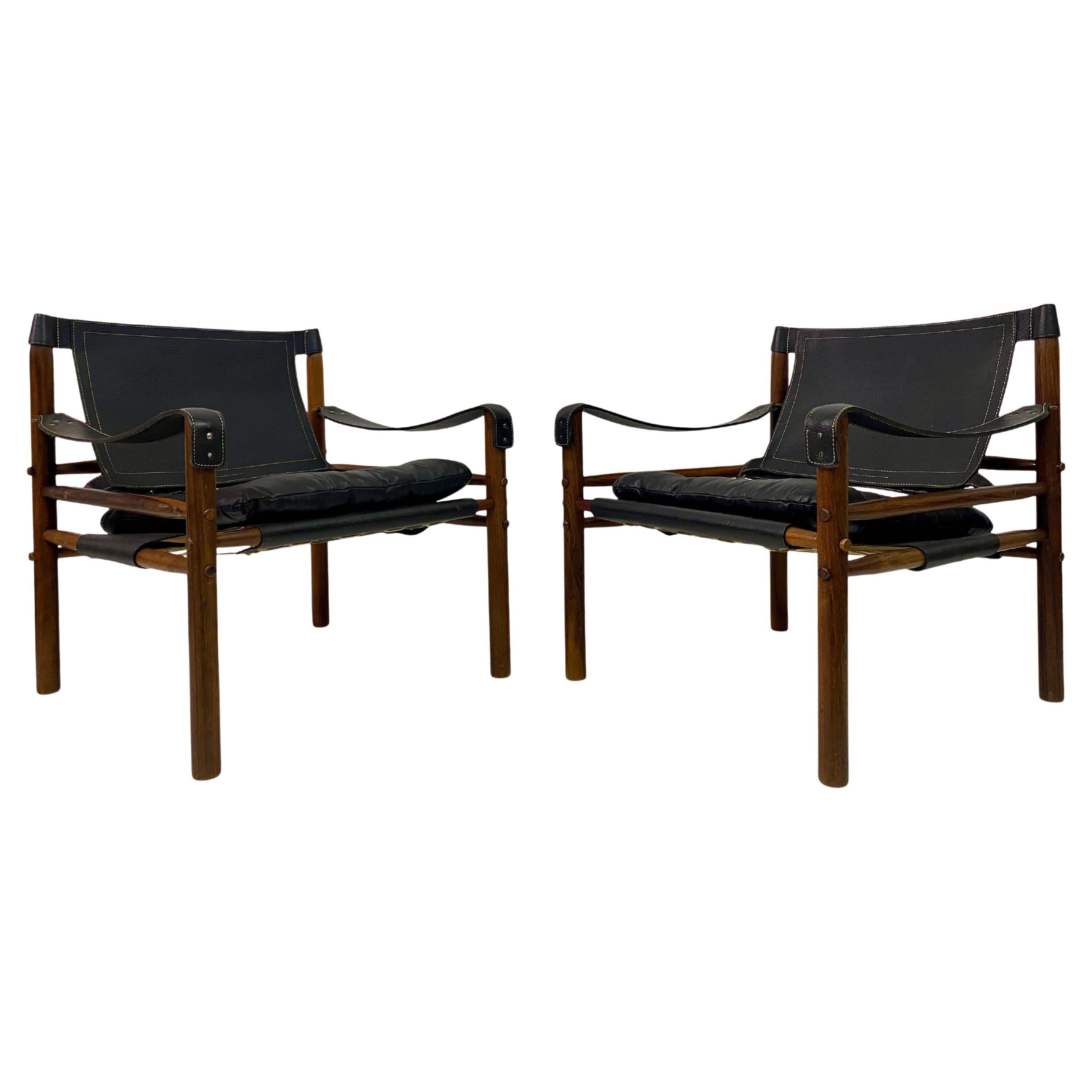 Pair of Leather and Rosewood Sirocco Safari Chairs by Arne Norell