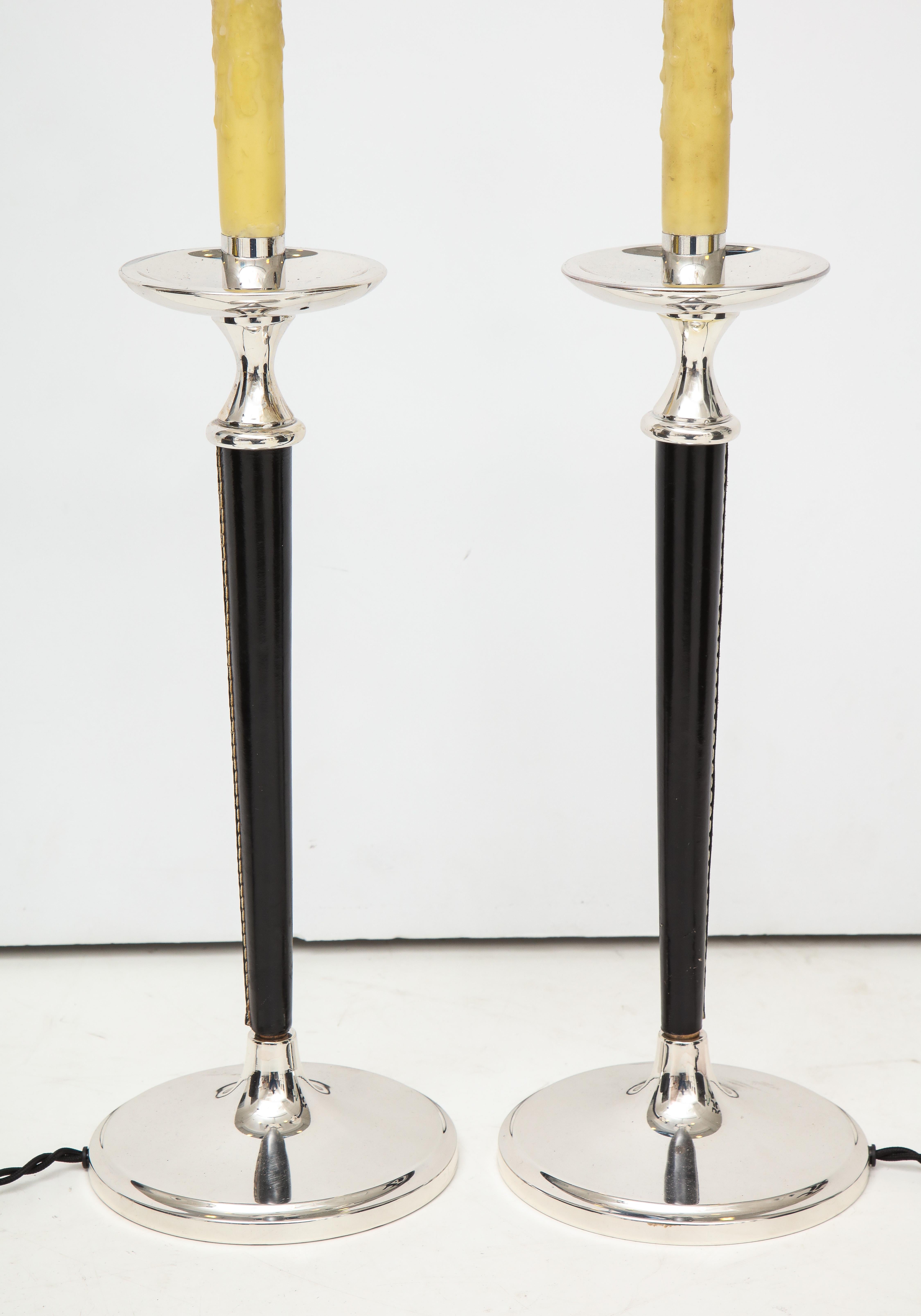 Pair of French leather and silver lamps in the style of André Arbus.