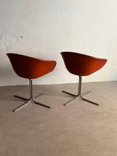 Pair of leather and steel armchairs in the manner of Pierre Paulin, 1980s