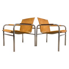 Paire de fauteuils en cuir et acier tubulaire par Tord Bjorklund:: Suède:: 1980