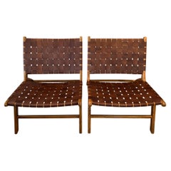 Paire de chaises en cuir et bois conçues par Olivier De Schrijver