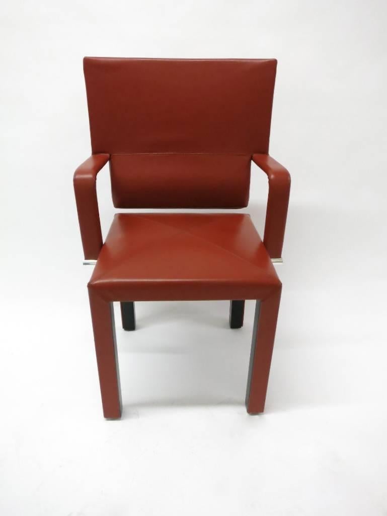 Pair of red-brown leather armchairs, model 