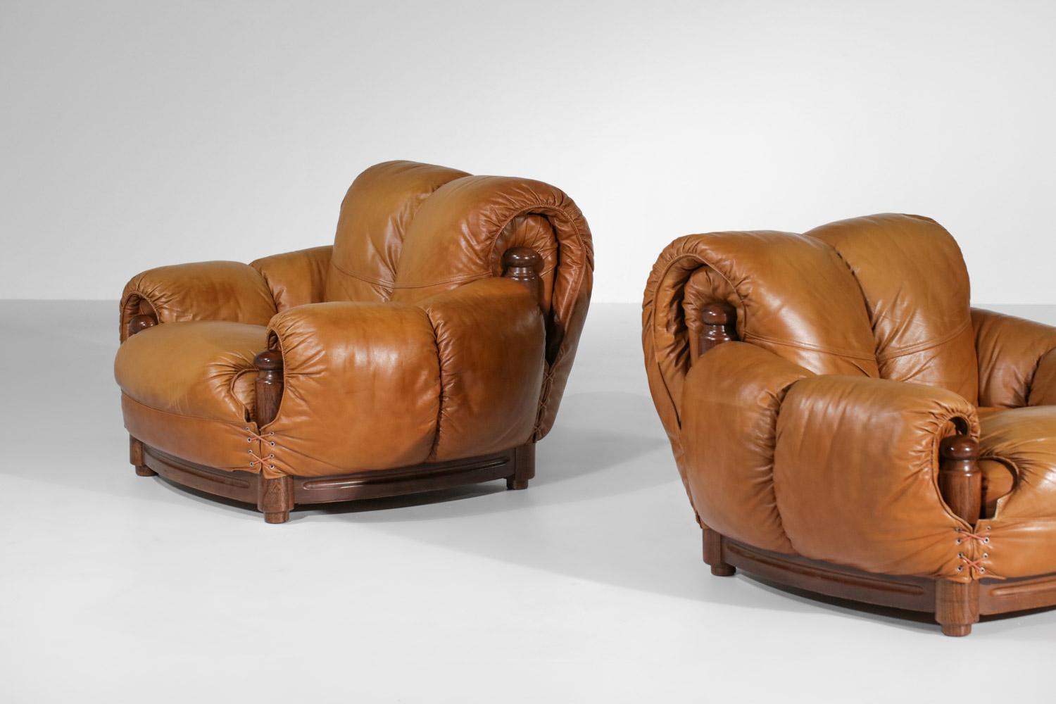 Pair of leather armchairs cognac curved ball years 70 For Sale 11