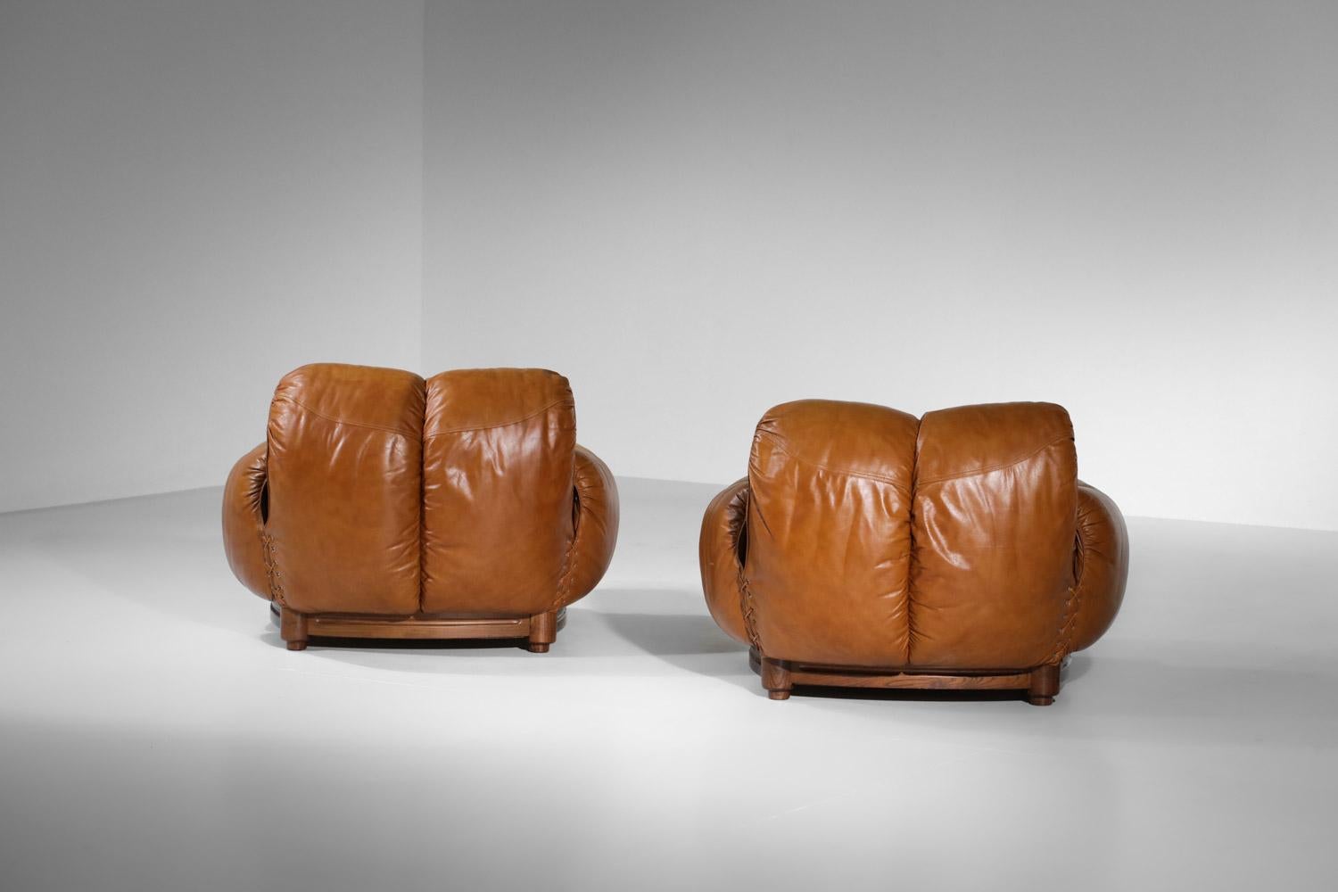 Pair of leather armchairs cognac curved ball years 70 For Sale 13