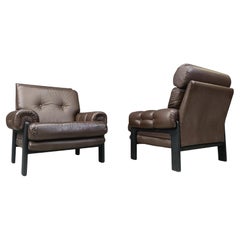 Pair of leather armchairs made in Denmark, 1960s