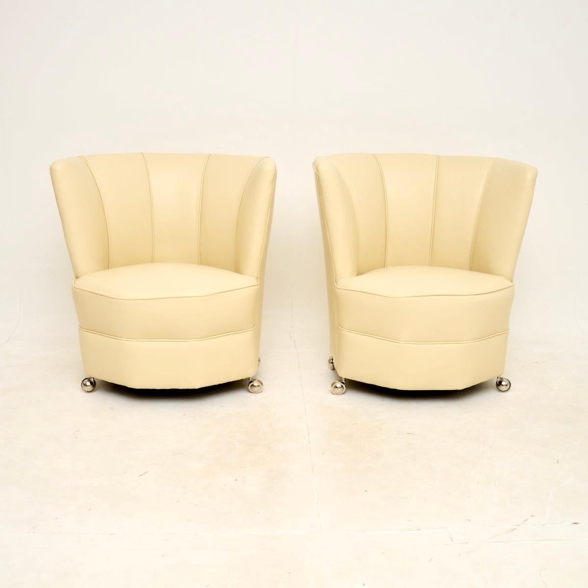 A stunning pair of leather Art Deco armchairs, made in England and dating from the 1920-30’s.

They are of amazing quality and are a lovely, petite size. They would be perfect as bedroom chairs are occasional side chairs in various settings around