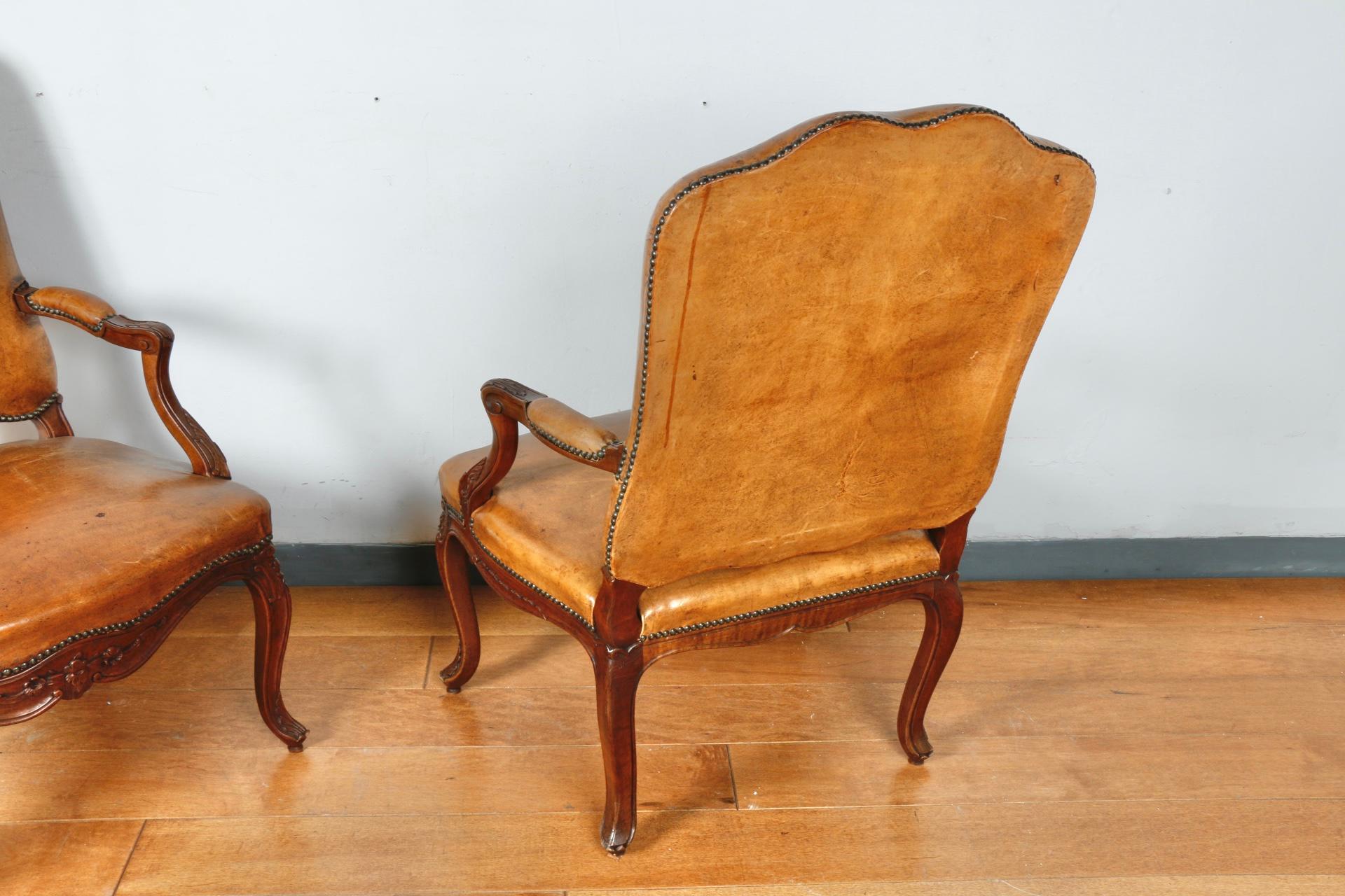 Mid-20th Century Pair of Leather Bergere Chairs For Sale