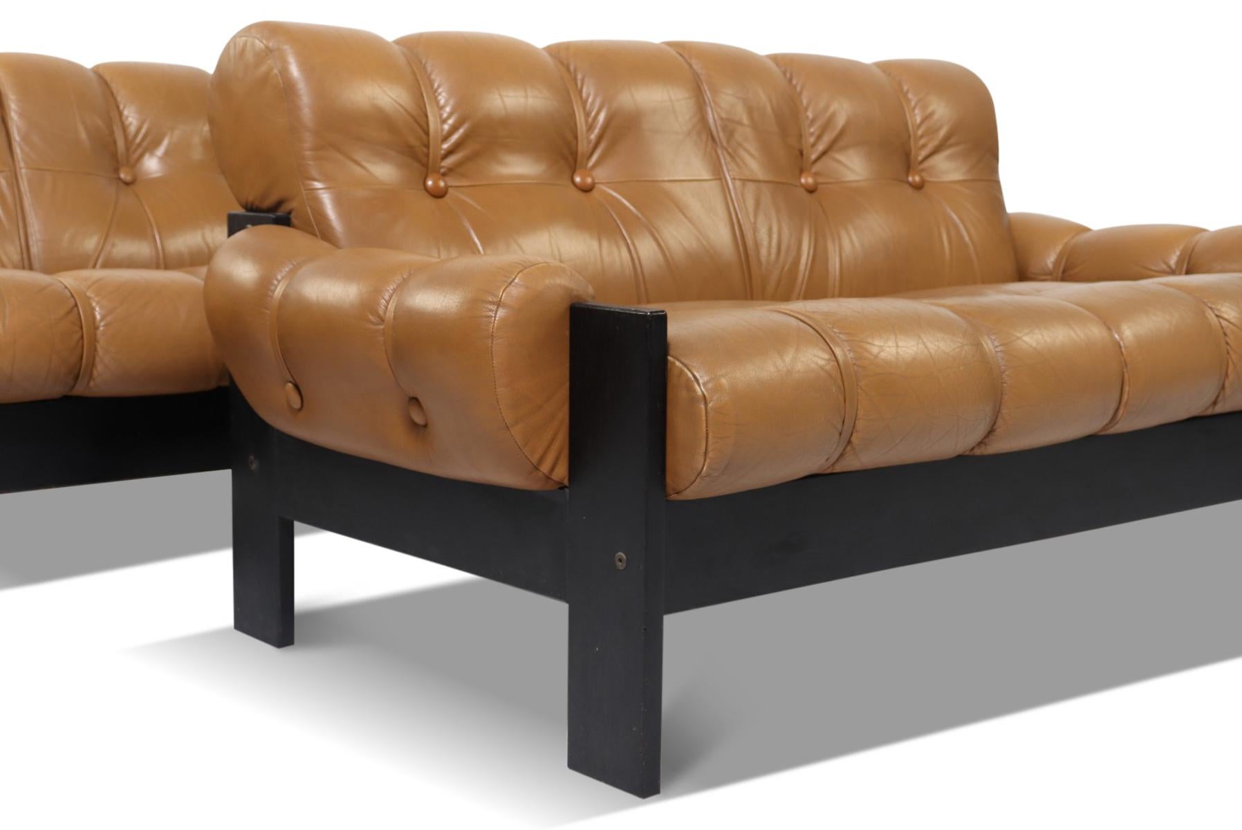 Mid-Century Modern Pair of Leather + Black Lacquered Sofas by Uu-Vee Kaluste Oy For Sale