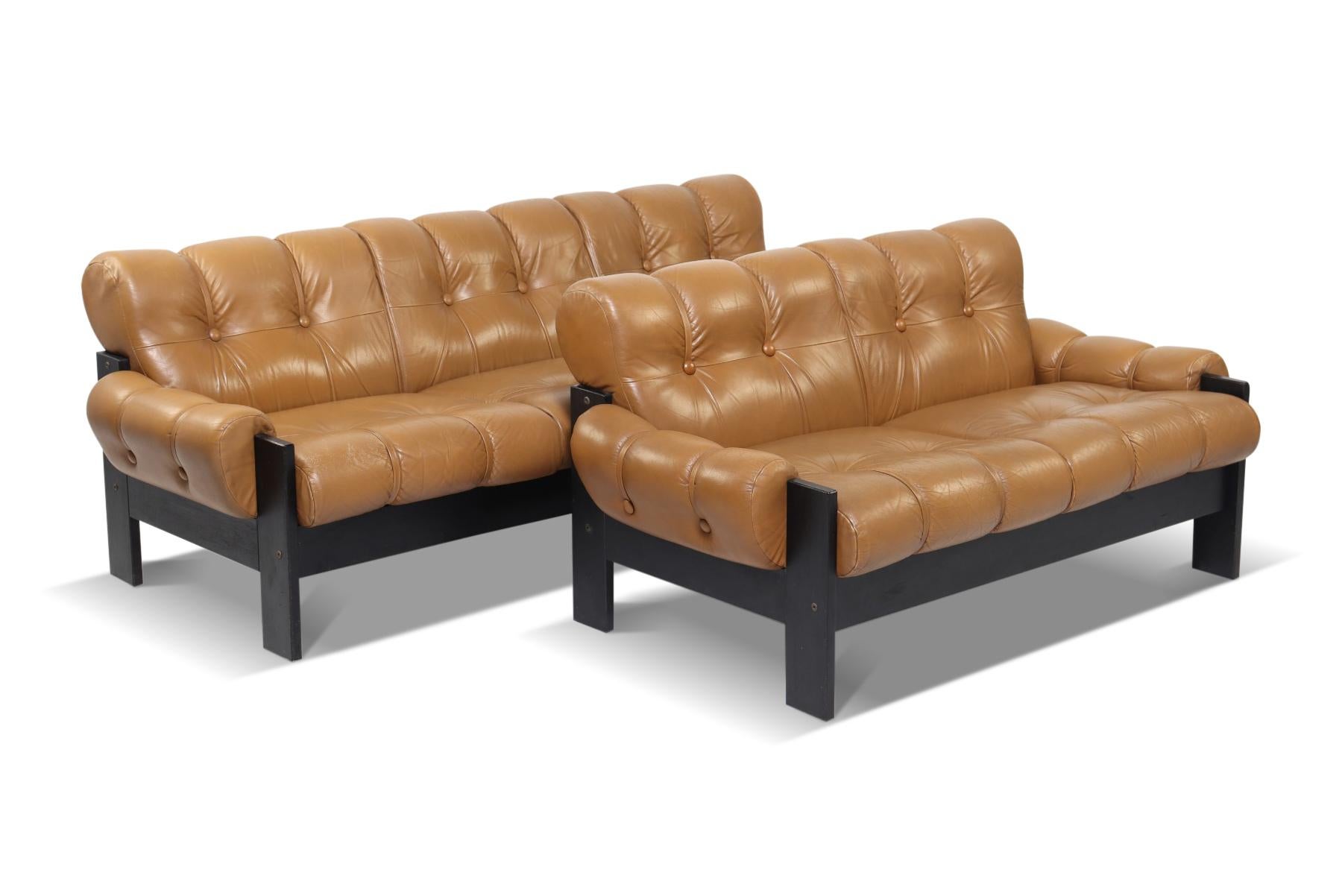 Pair of Leather + Black Lacquered Sofas by Uu-Vee Kaluste Oy In Good Condition For Sale In Berkeley, CA