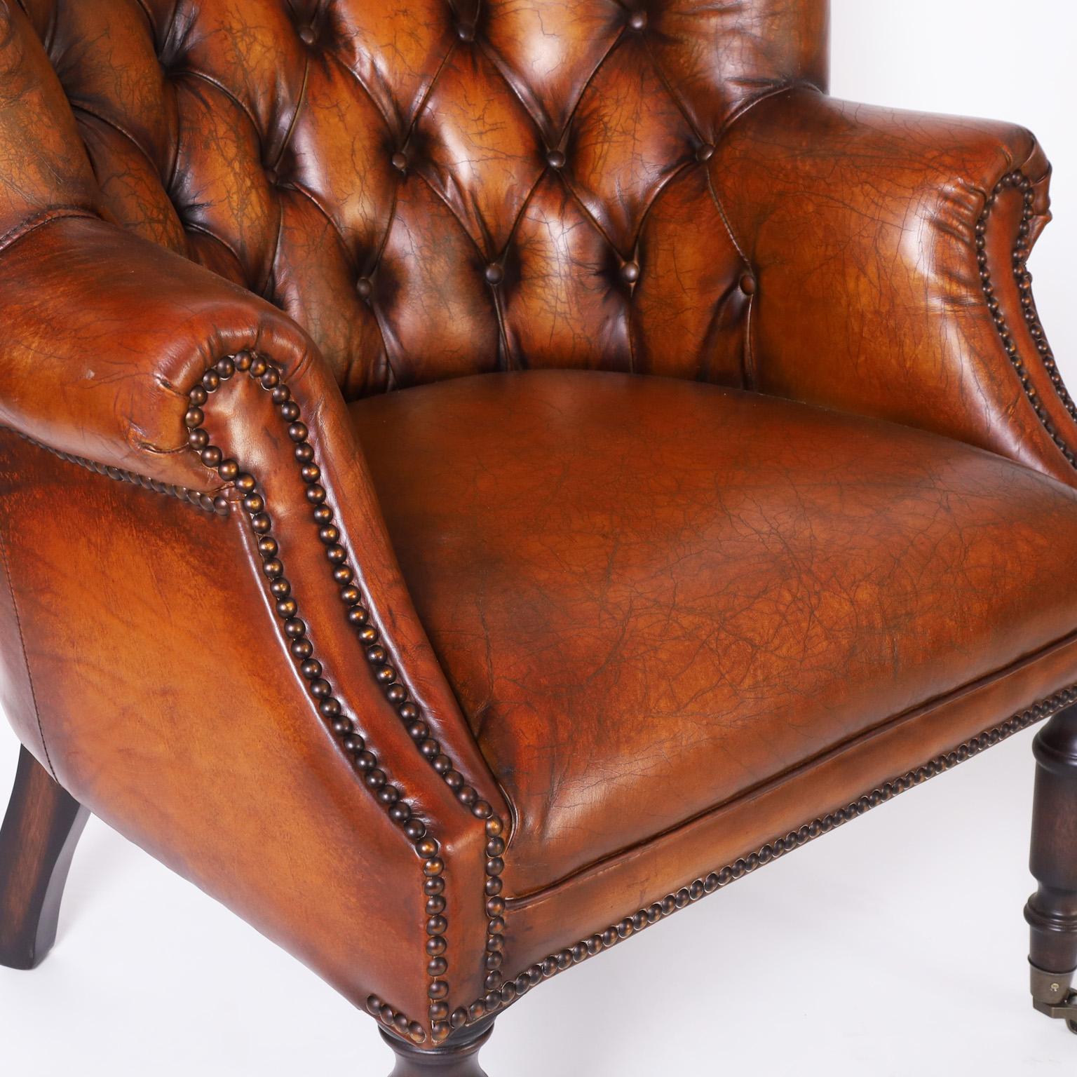 Pair of Leather Button Tufted Wingback British Colonial Style Armchairs For Sale 1