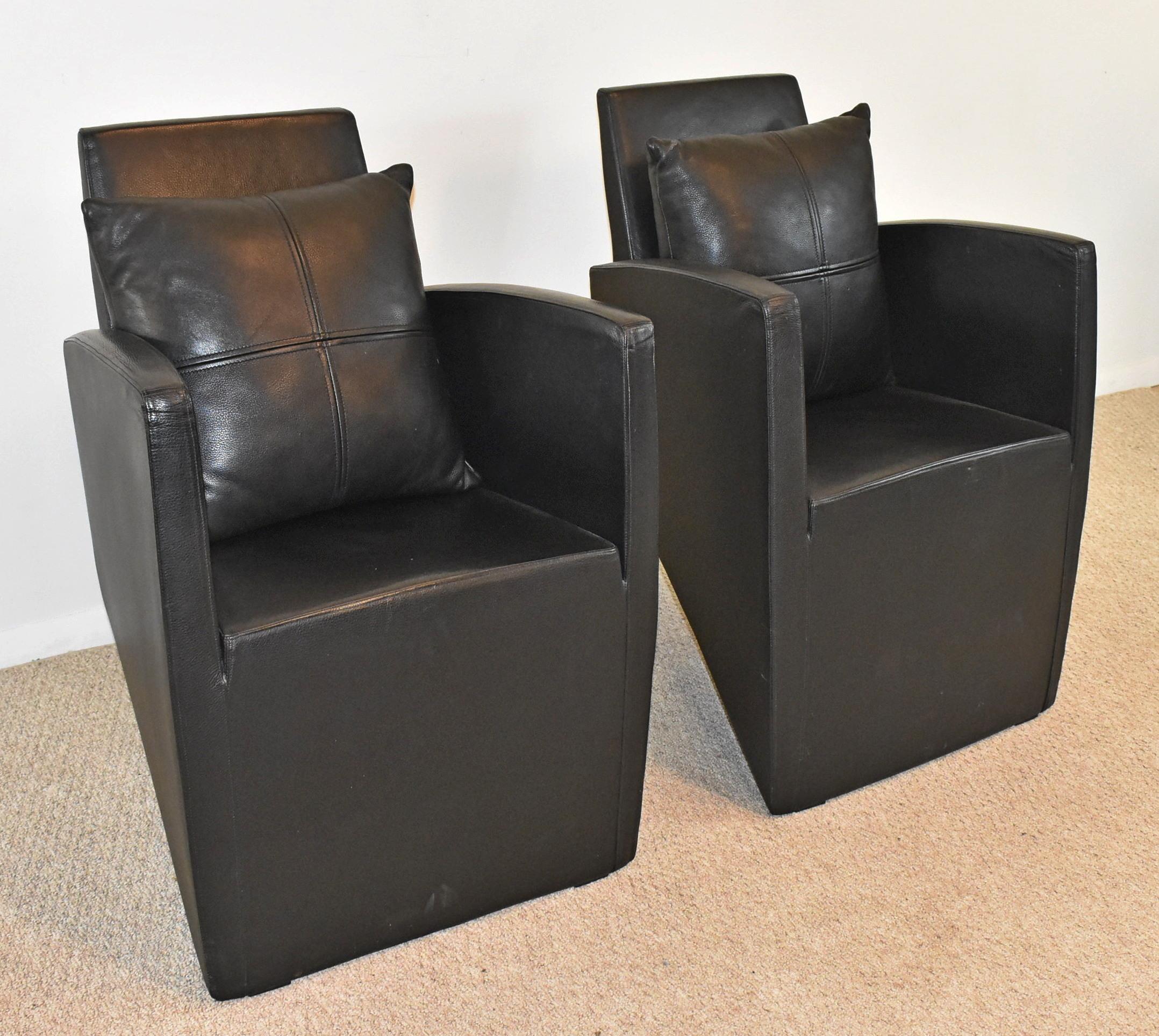 Pair of leather chairs by Philippe Starck for Aleph. circa 1987. Pair of leather lounge chairs with blade-like cast aluminum back leg. Marked on the leg, 