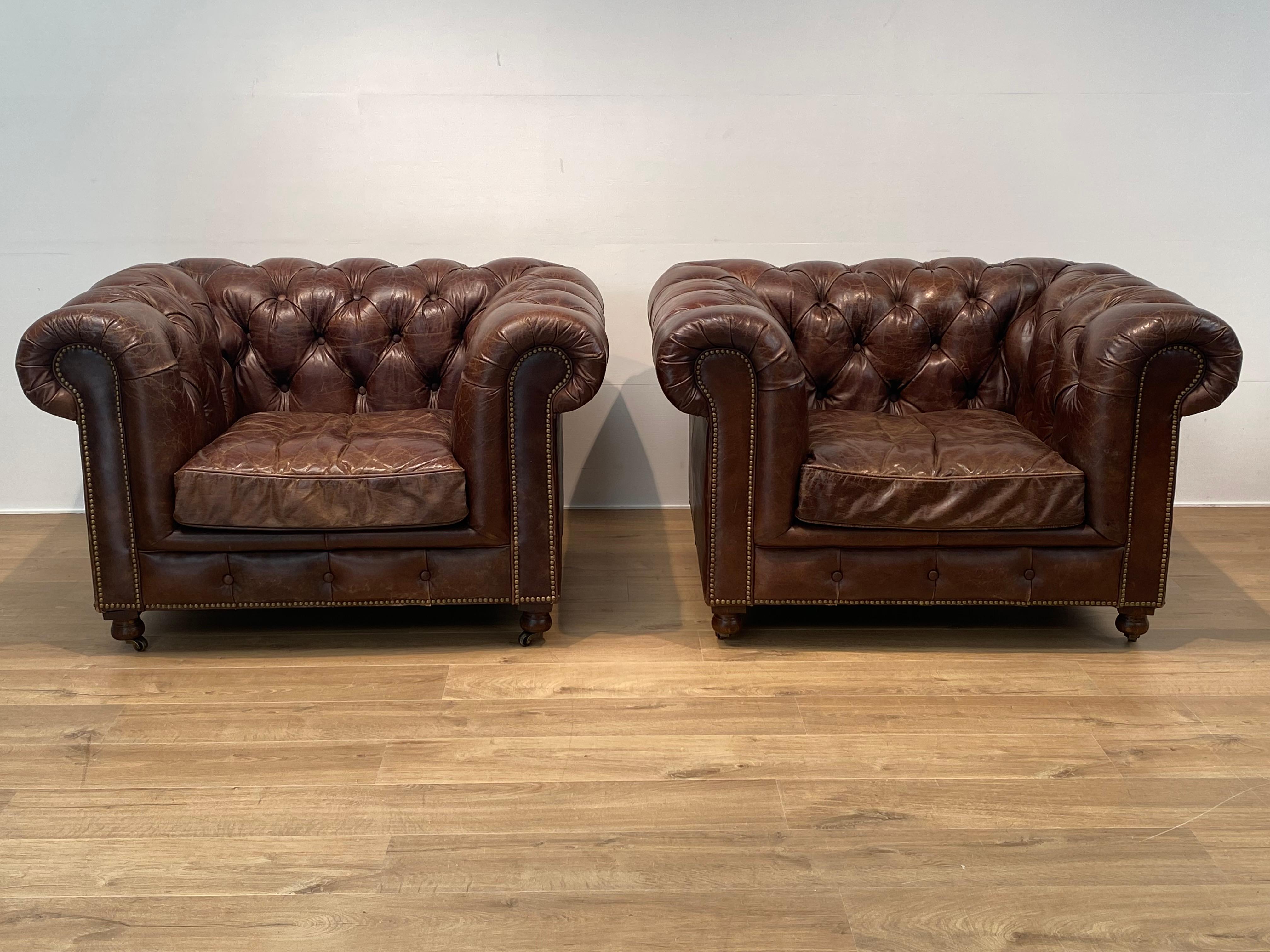 British Pair of Leather Chesterfield Chairs For Sale