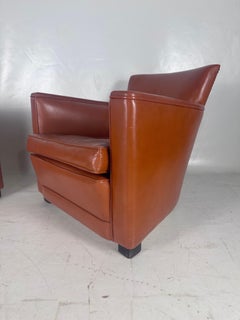 Pair of leather club chairs