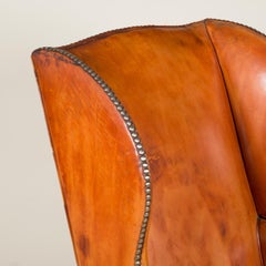 Pair of Leather Covered Wing Armchairs with Chamfered Square Section Legs