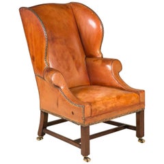Pair of Leather Covered Wing Armchairs with Chamfered Square Section Legs