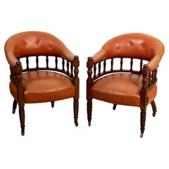 Pair of Leather English Barrel Back Chairs