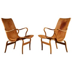 Pair of Leather Eva Chairs by Bruno Mathsson