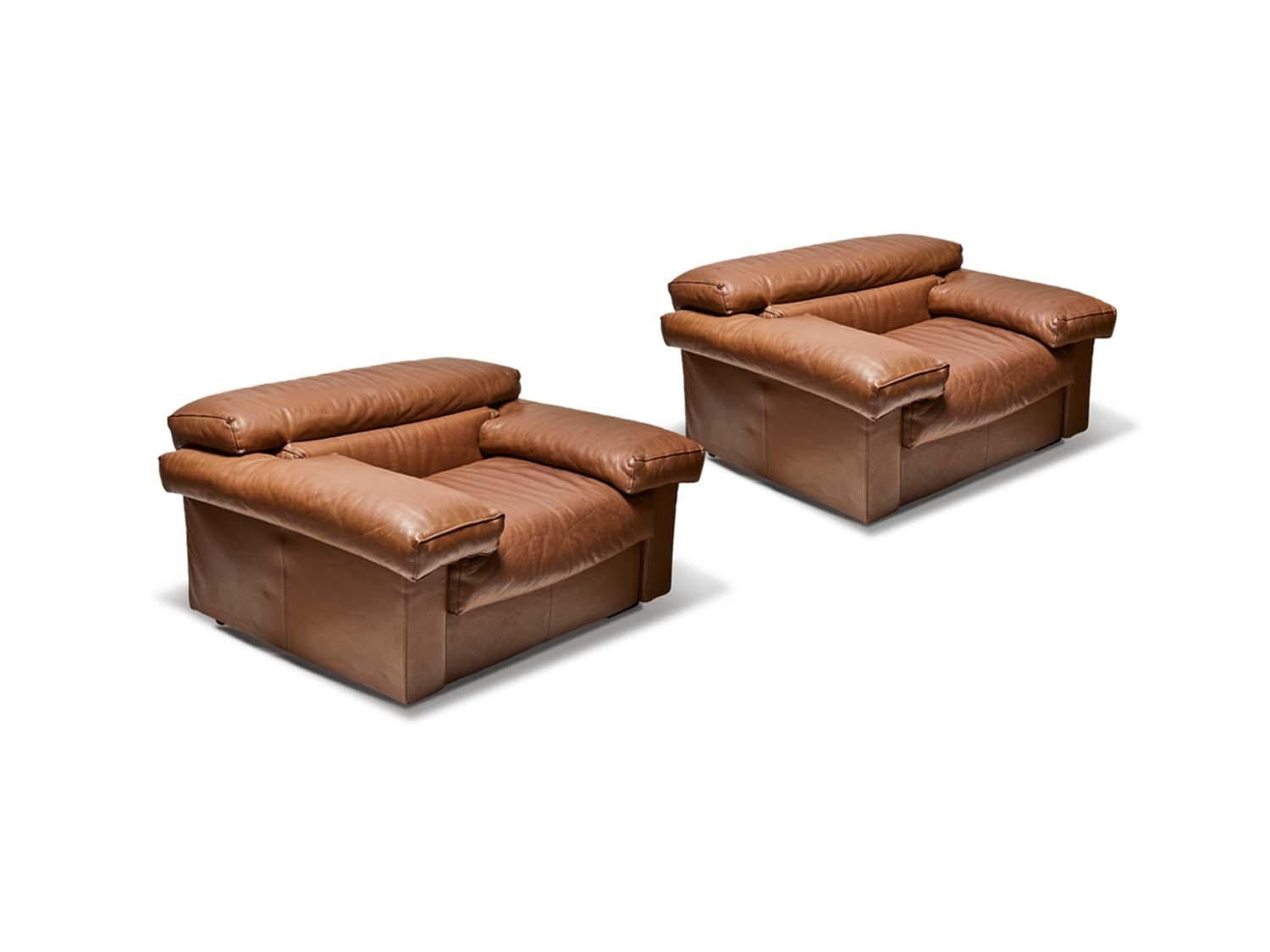 Pair of leather lounge chairs by Tobia Scarpa.