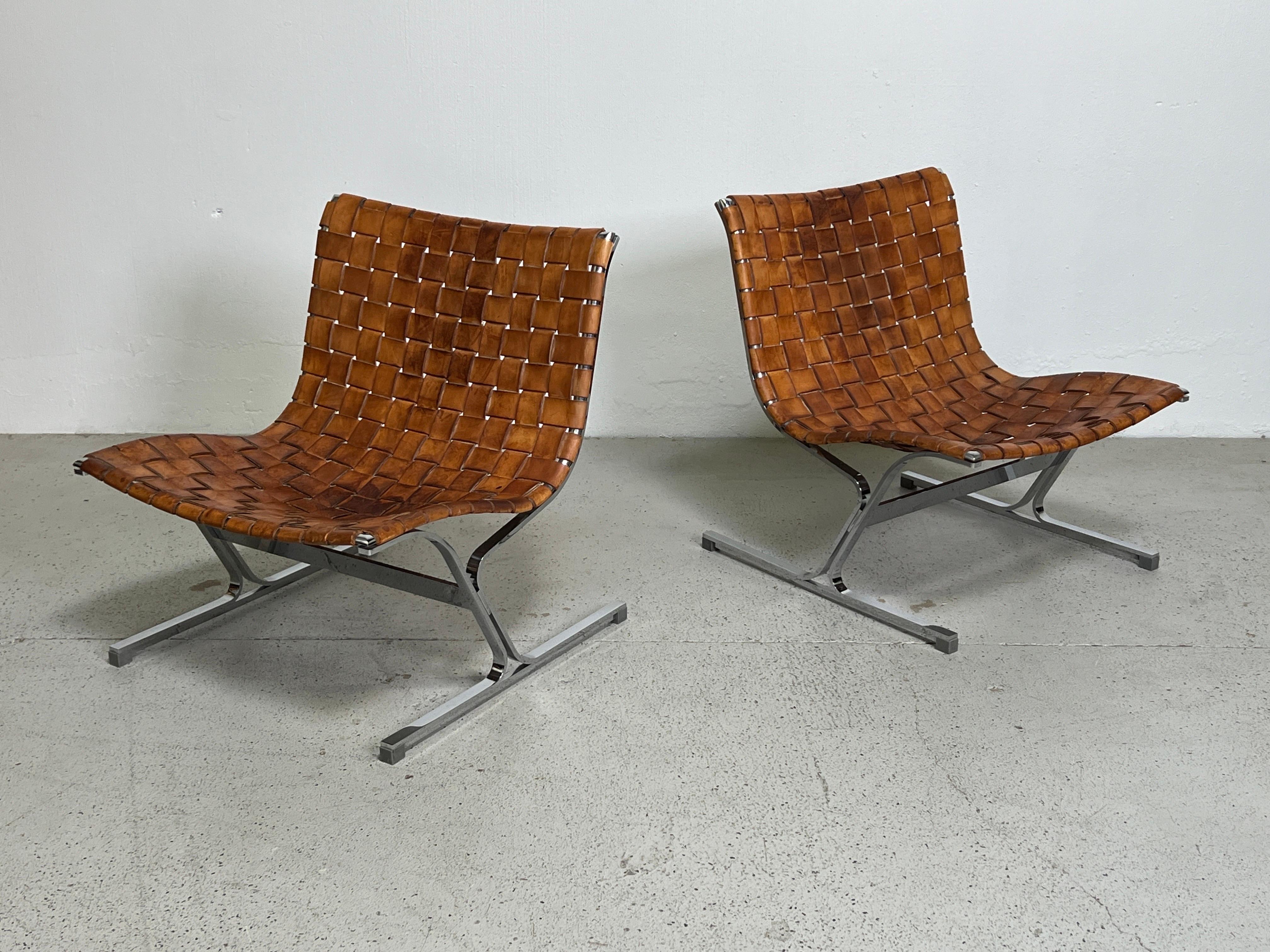 A pair of beautifully  patinated leather strap 'Laura' lounge chairs designed by Ross Littell for ICF.