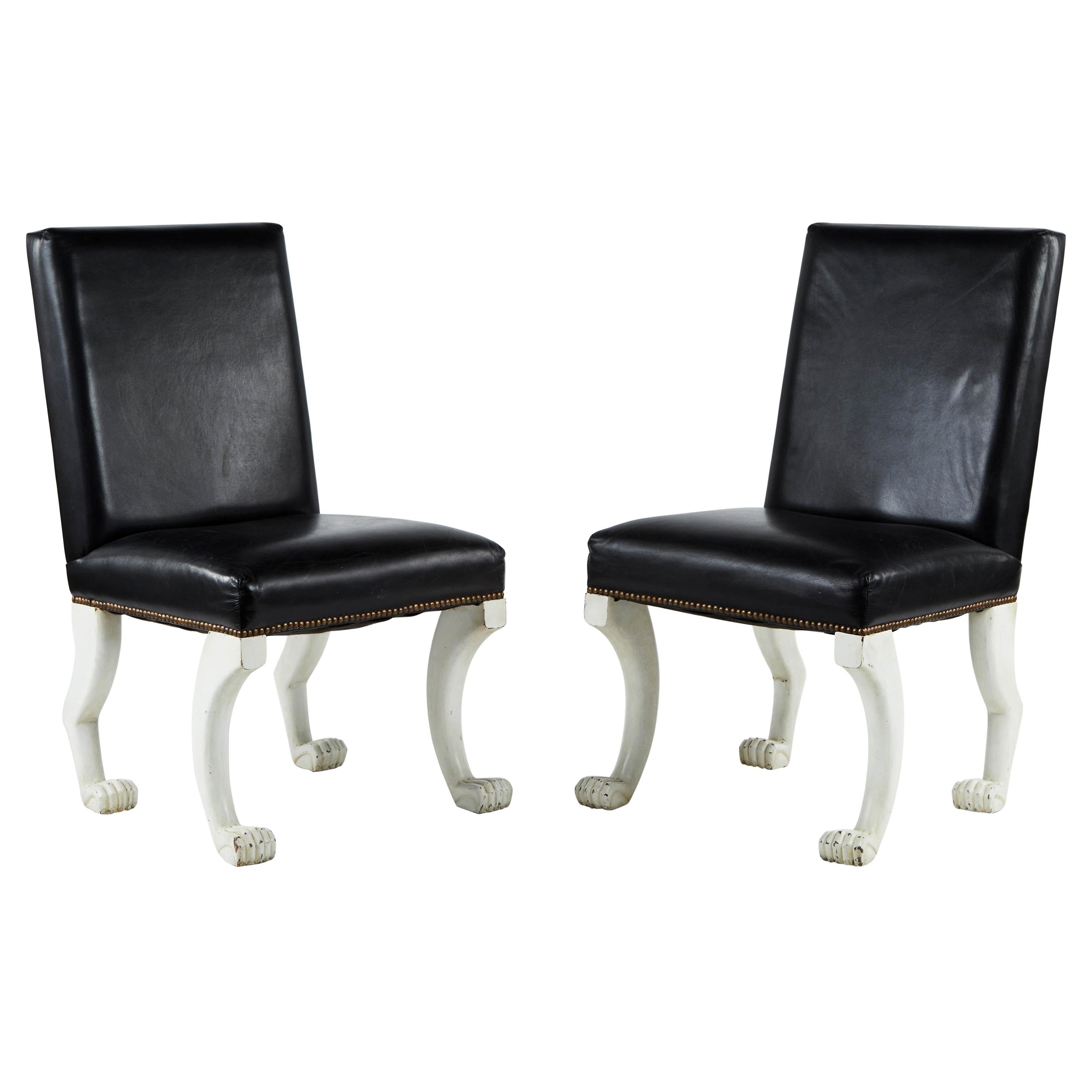 Pair of Leather Paw-Foot Chairs