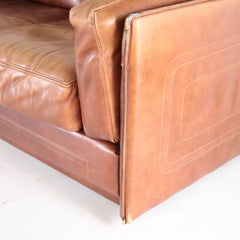Pair of leather Roche Bobois loveseats