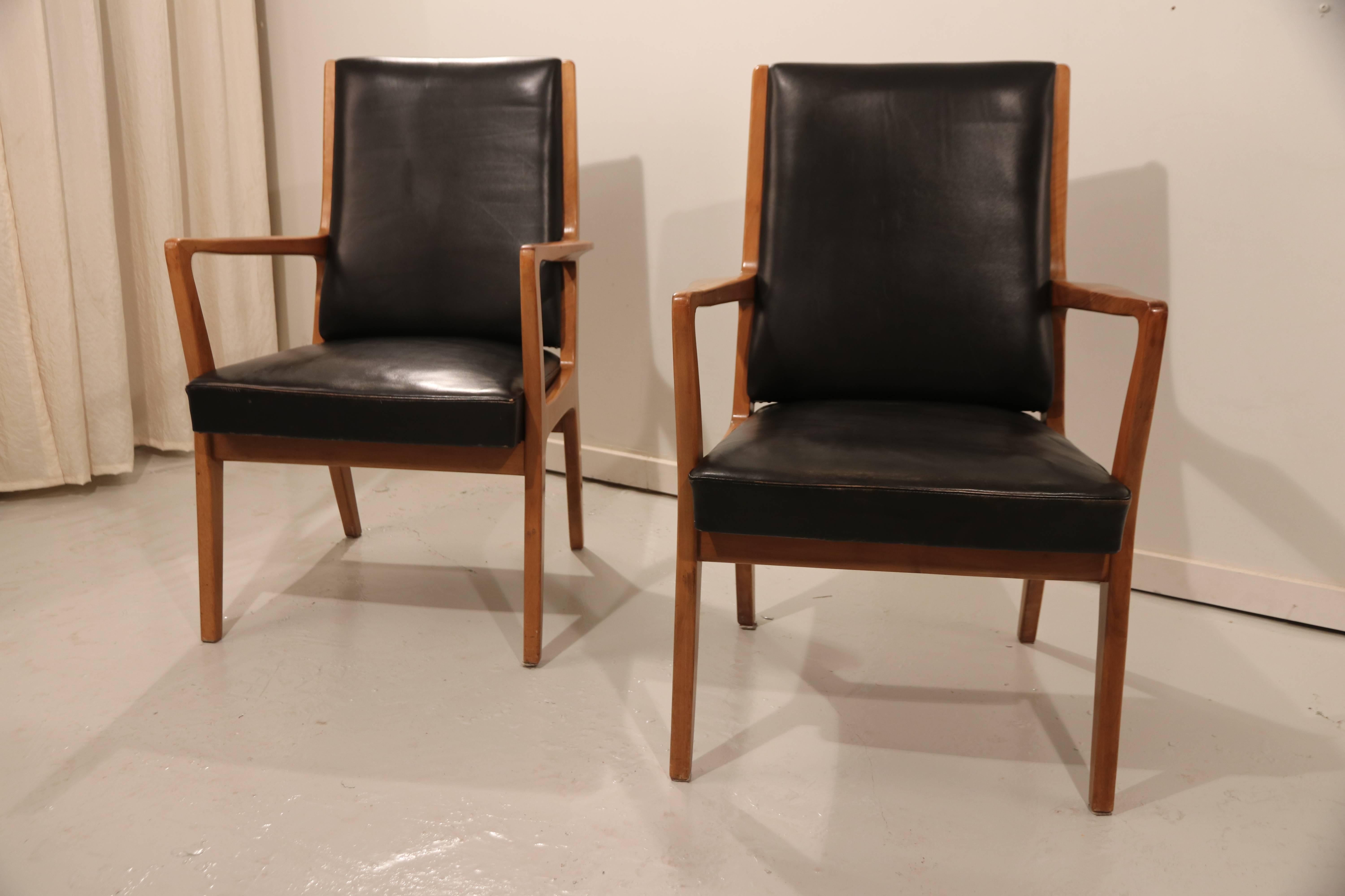 A wonderful set of two large beautifully shaped side chairs or dining chairs with a beautiful soft aniline leather seat. The chairs were once sold by Cologne's chicest furniture shop, named Pesch. These chairs are ideal as side chairs for in the