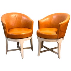 Pair of Leather Swivel Armchairs
