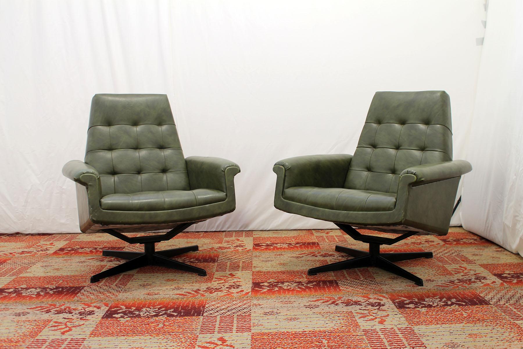Pair of swivel armchairs from the 1970s manufactured by UP Zavody in the former Czechoslovakia.
This type of chair is characterized by an innovative molded extended construction.
These iconic chairs have a slightly curved shaped design on an