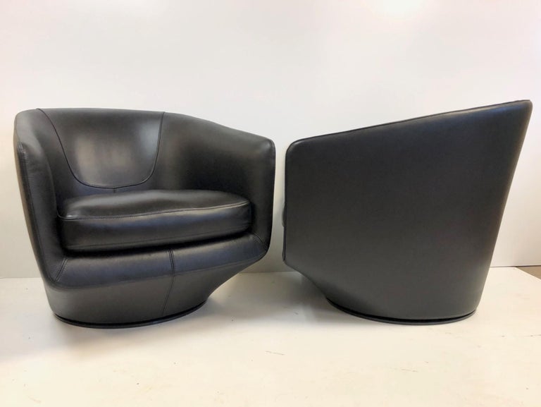 Modern Pair of Leather Swivel Lounge Chairs by Bensen For Sale