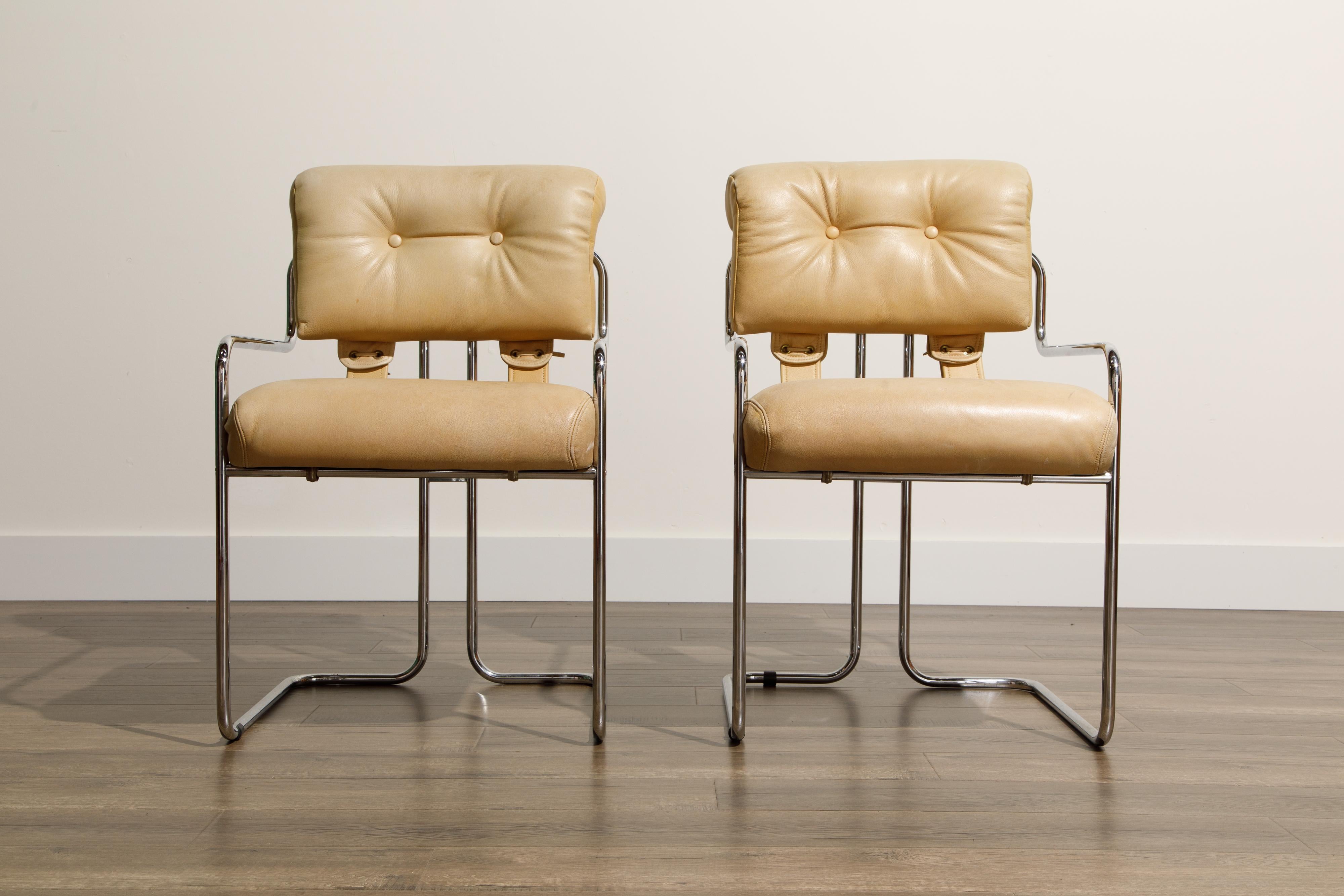 Currently, the most coveted dining chairs by interior designers are 'Tucroma' chairs by Guido Faleschini for i4 Mariani, and we have this incredible pair Tucroma armchairs (priced for the pair) in tan / beige colored leather with lovely patina