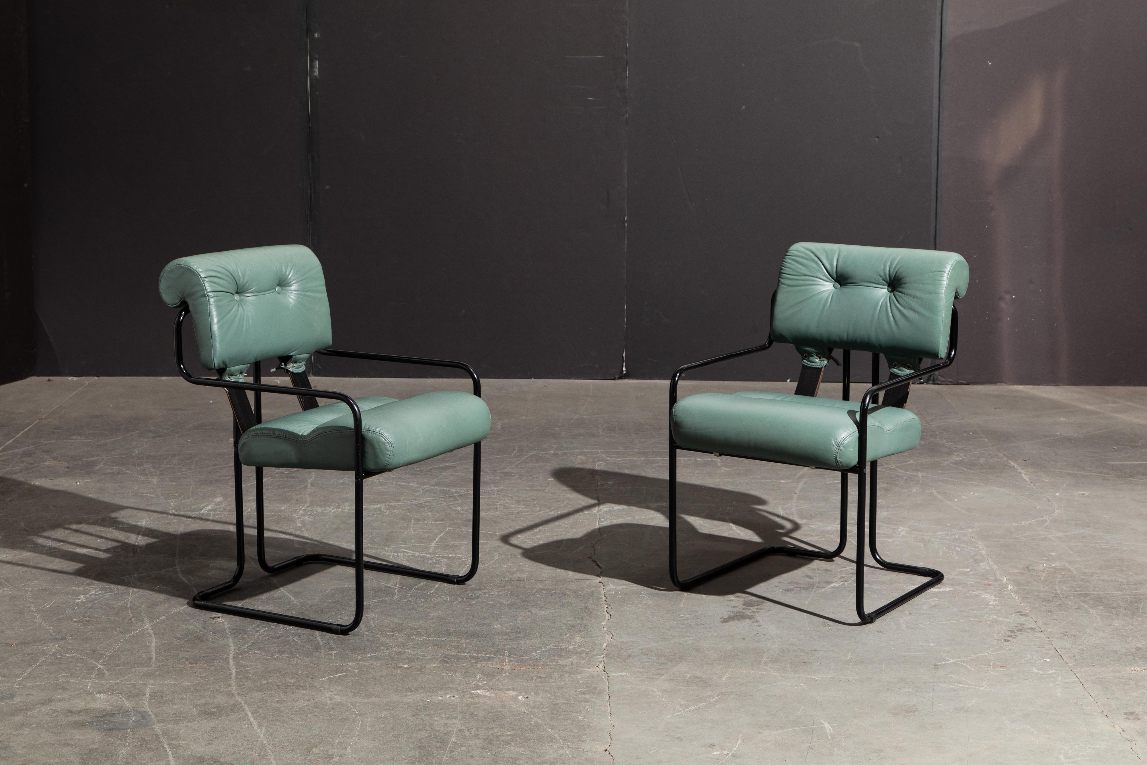 Currently, the most coveted dining chairs by interior designers are the 'Tucroma' chairs by Guido Faleschini for i4 Mariani, and we have this incredible pair of Tucroma armchairs in beautiful leather with rare black frames. The seats and backs