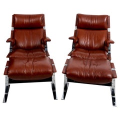 Pair of Leather Upholstered Chairs with Ottomans