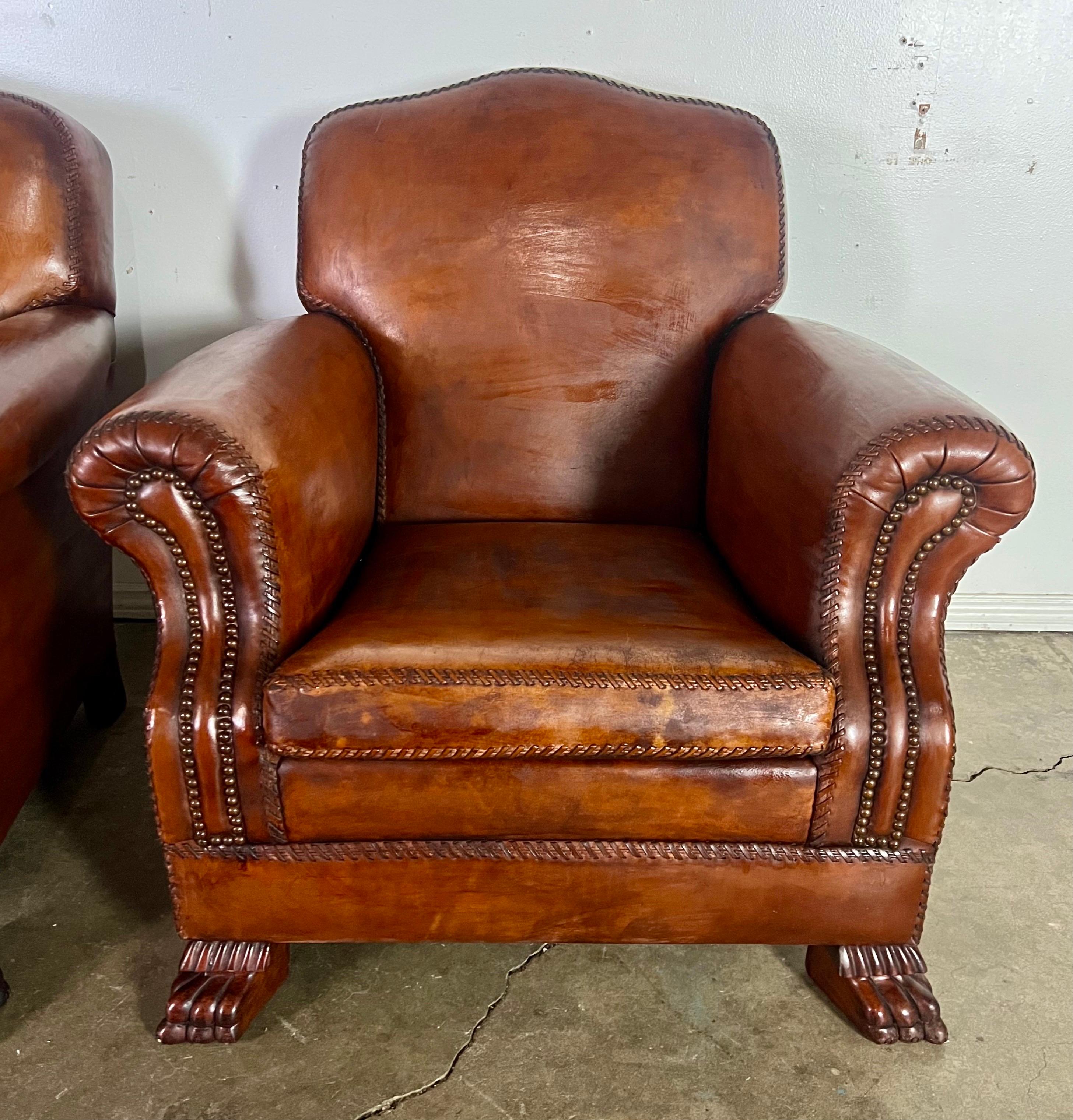 Pair of Leather Upholstered Club Chairs In Distressed Condition For Sale In Los Angeles, CA