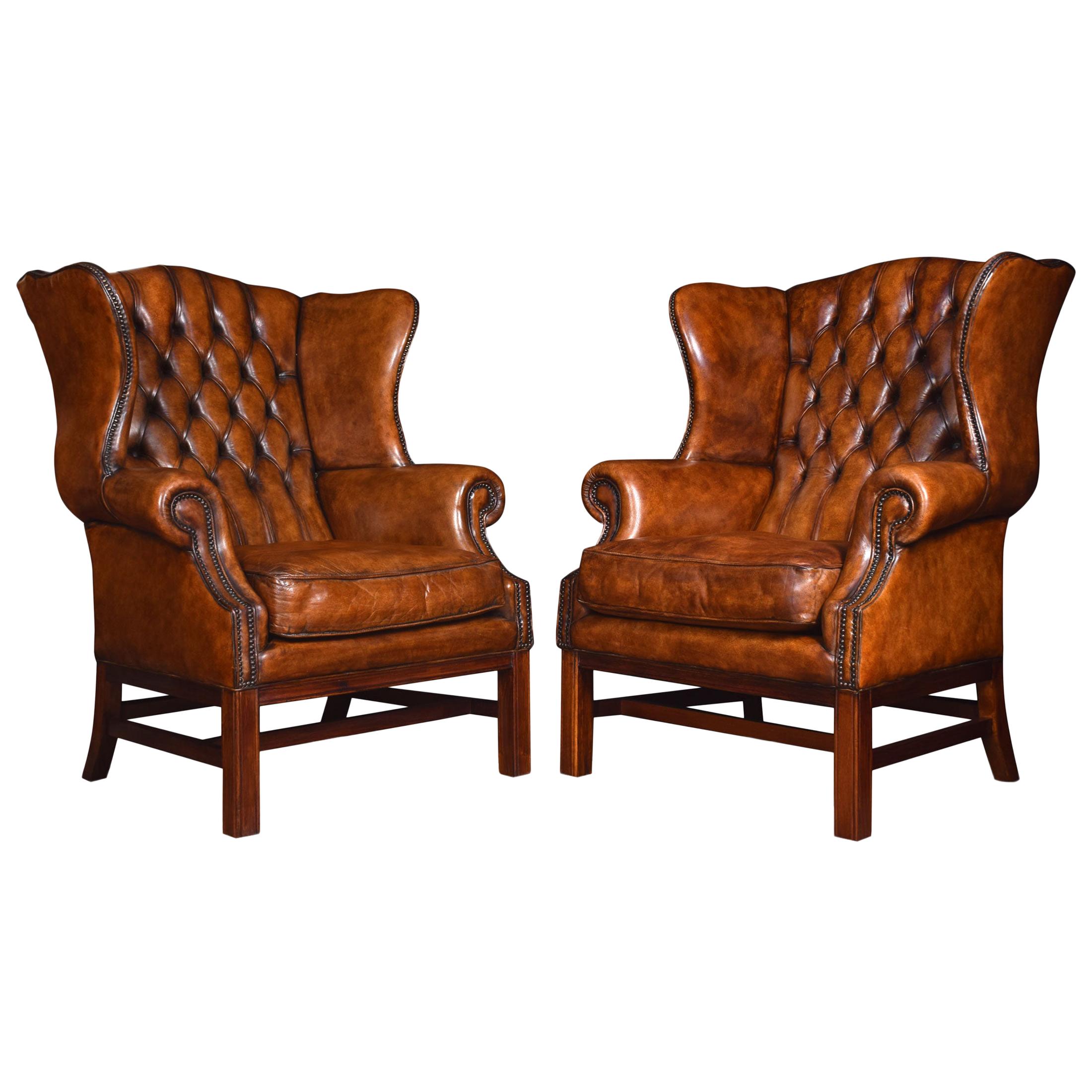 Pair of Leather Upholstered Wingback Armchairs
