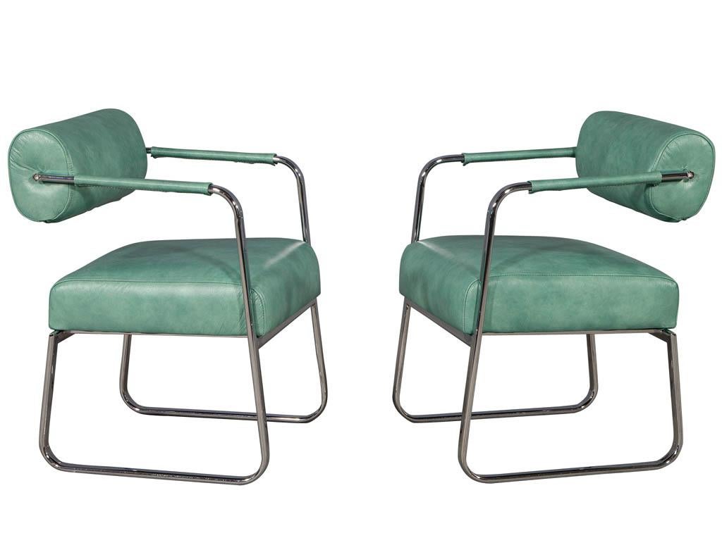 Pair of leather vintage modern roll back accent chairs. Vintage stainless steel frames from France, newly upholstered in a distressed mint leather.

Price includes complimentary scheduled curb side delivery service to the continental USA.
