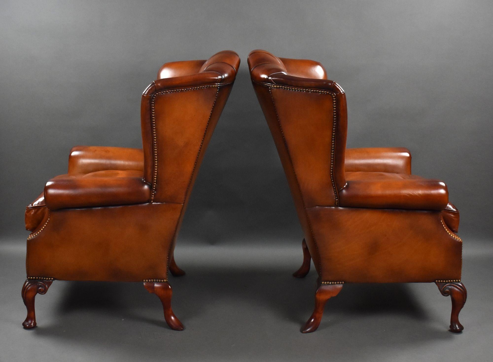 English Pair of Leather Wing Back Armchairs For Sale