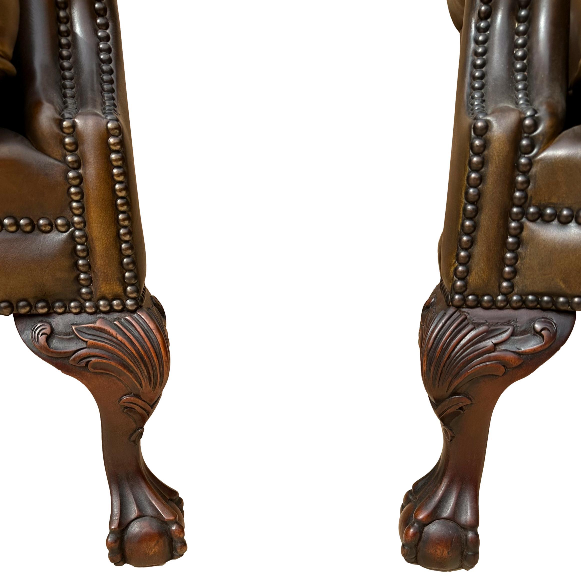 Pair of Leather Wing Back Tufted Chairs on Ball & Claw Feet, English, ca. 1920. For Sale 1