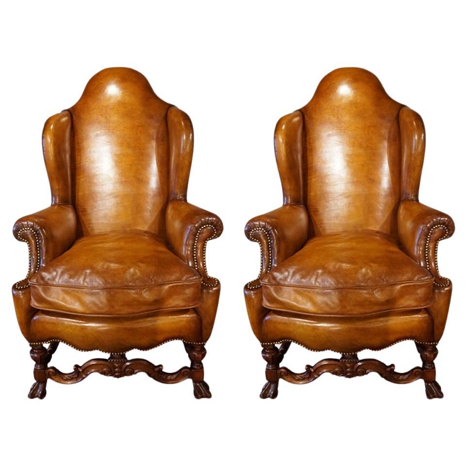 Pair of leather wingback chairs For Sale