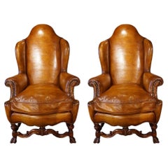 Pair of leather wingback chairs