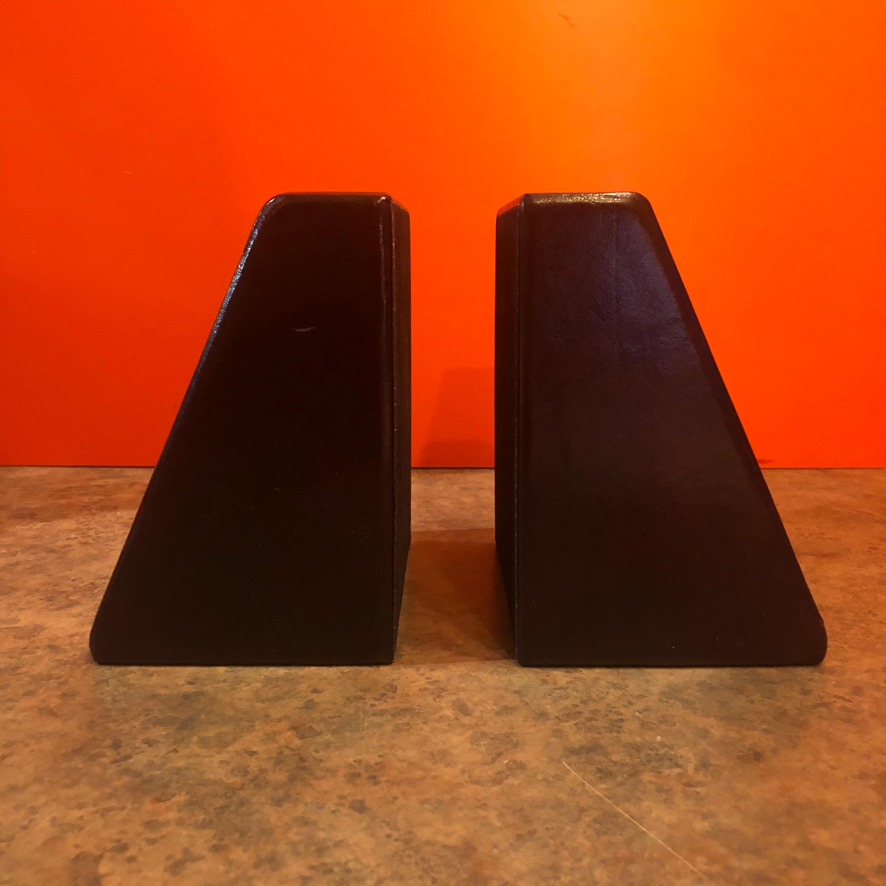 Pair of Leather Wrapped World Map Bookends In Good Condition In San Diego, CA
